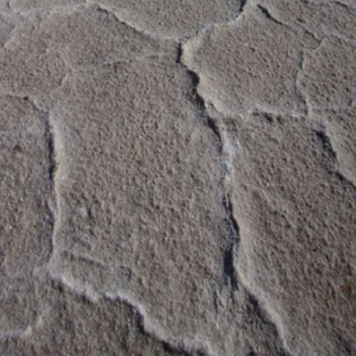 Tangled dark threads on light surface