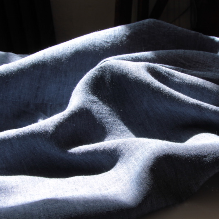 Cream jacket with colorful embroidery hanging