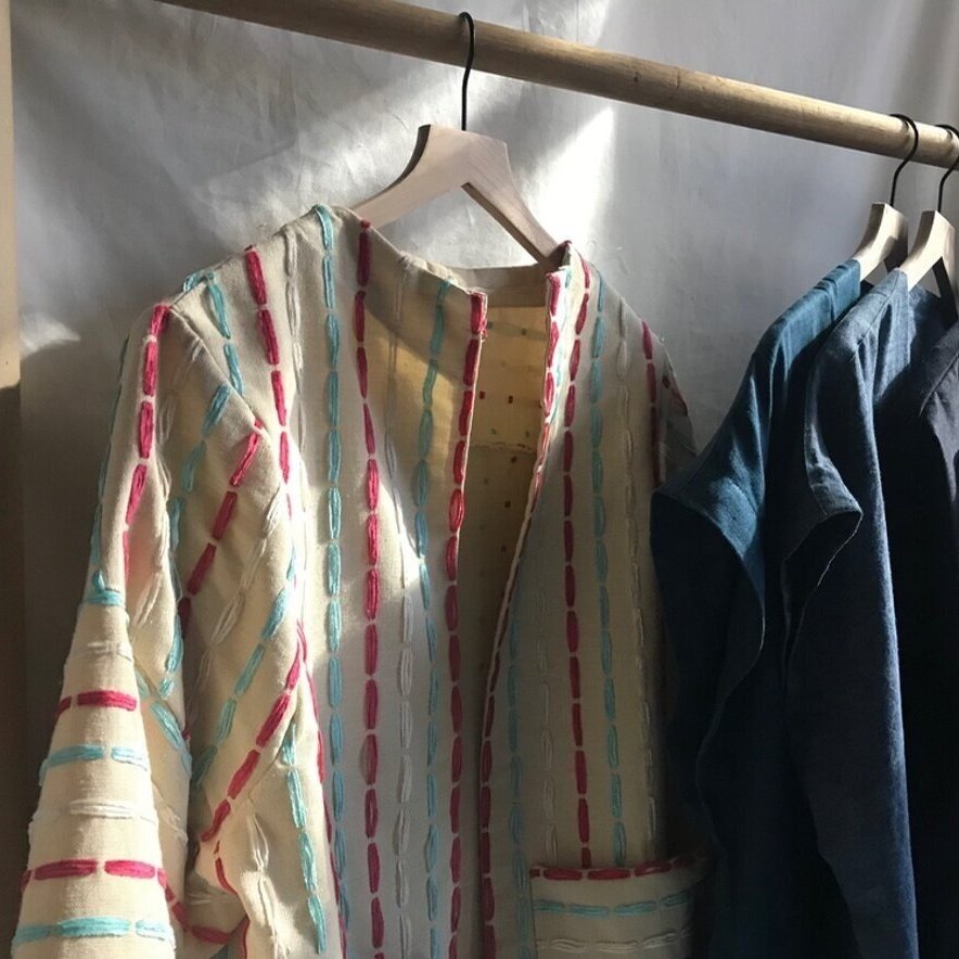 Tangled dark threads on light surface