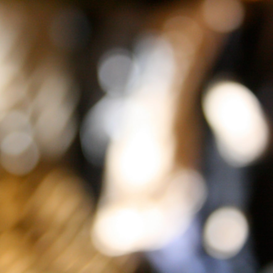 Cream jacket with colorful embroidery hanging