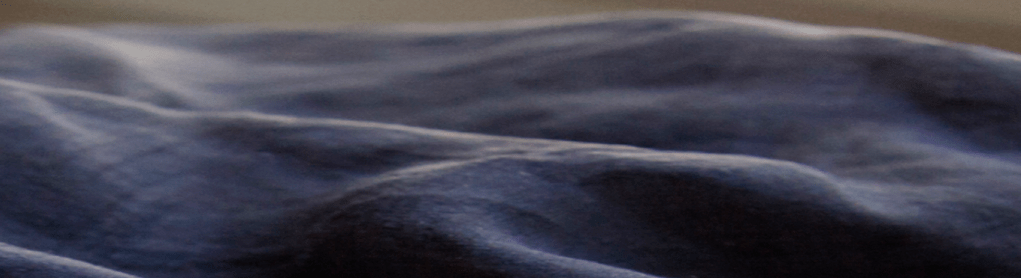 Close up of dark fabric curve